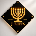 Jubilee Clock - Gold Menorah on black diamond-shaped acrylic wall clock
